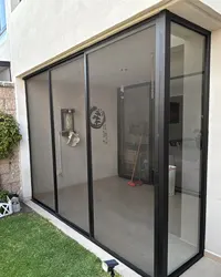 Mosquitero panorámico para patio trasero instalado por Grupo AVOS